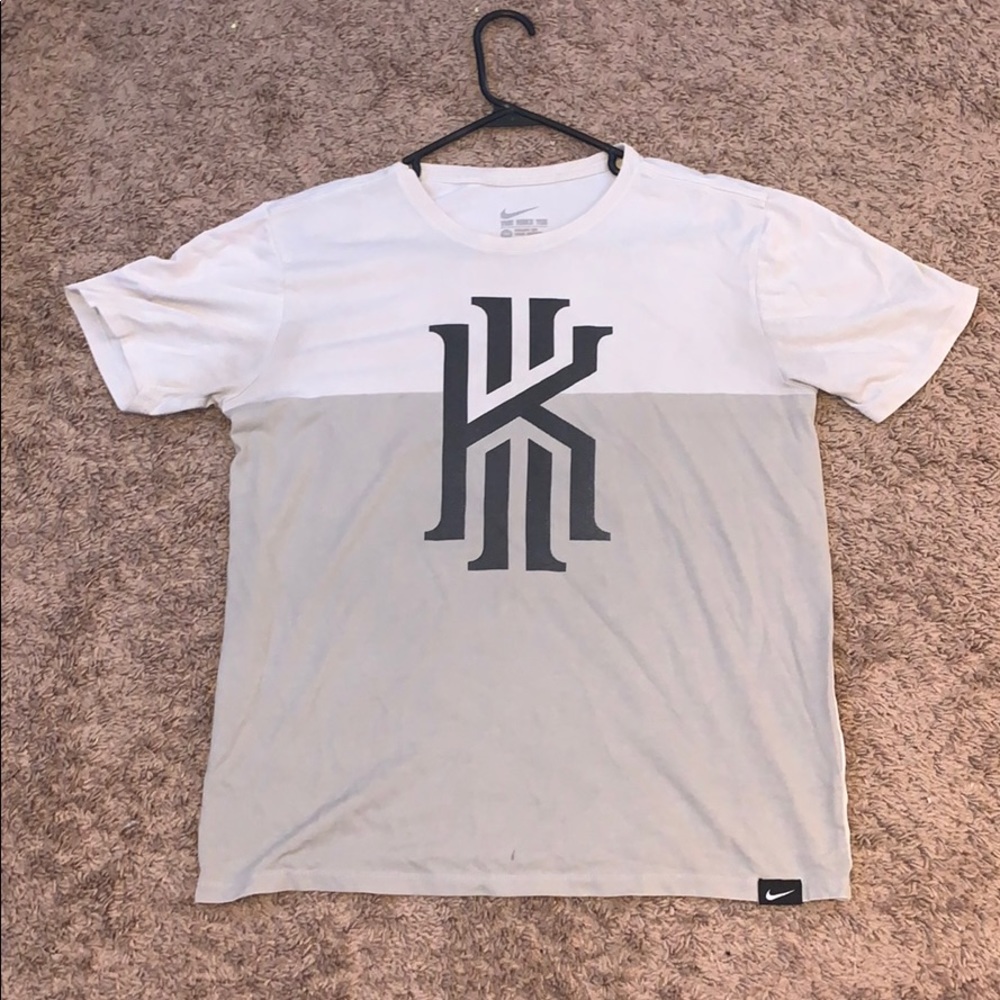 Nike grey, cream, and black tee